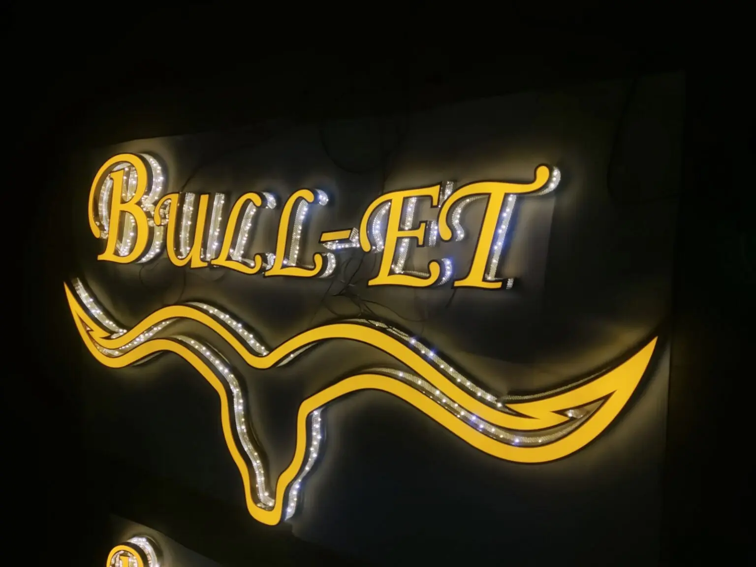 Custom dimensional logo feature installation