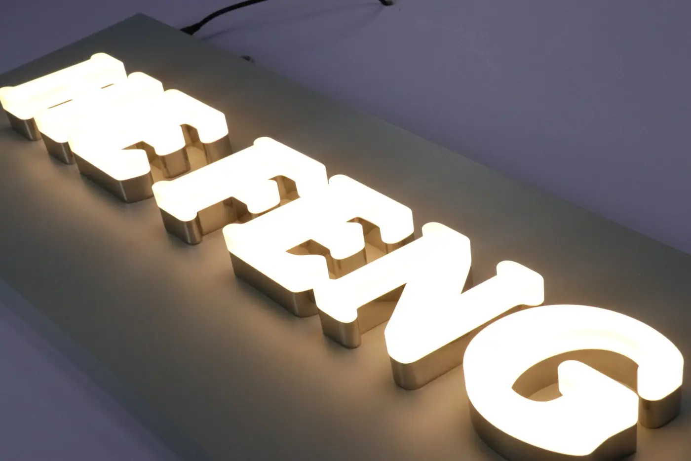 Prototype front-lit channel letter sample for repeat production