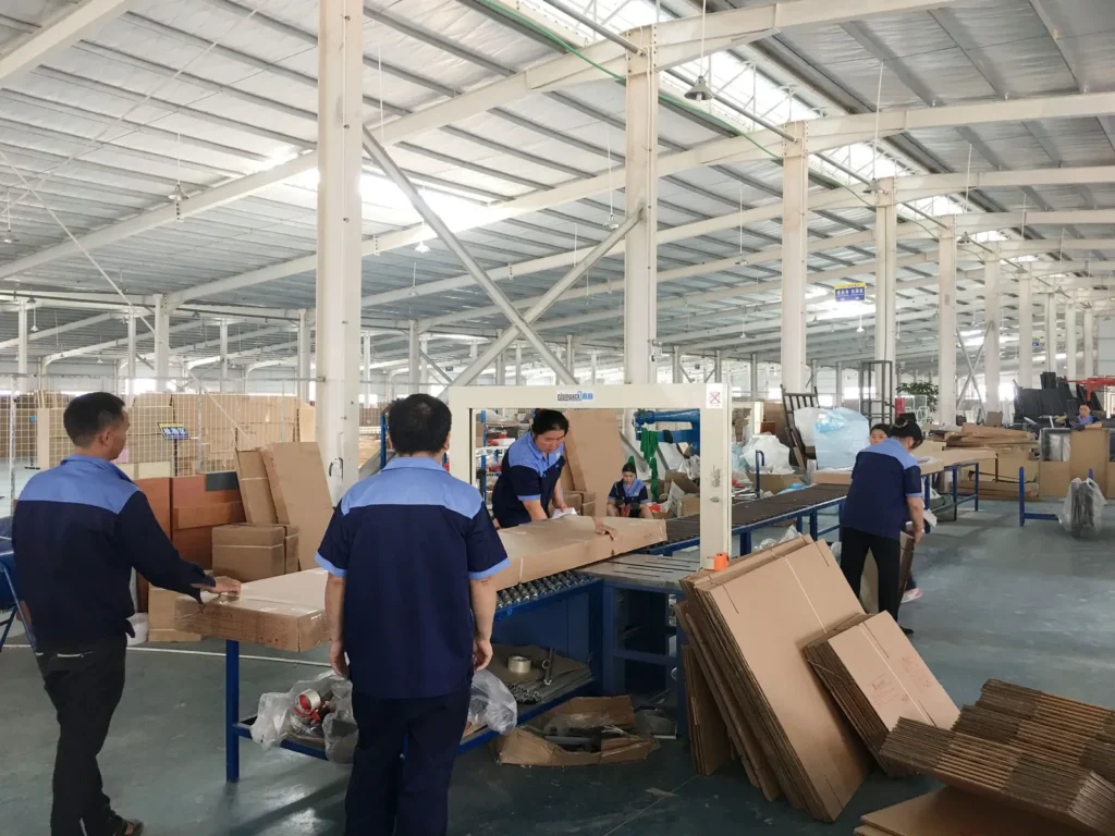 Custom sign components and packing prepared for shipment on the factory line